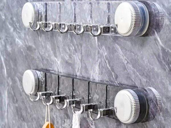 PERCHERO ACRÍLICO CON VENTOSA Y GANCHO PLEGABLE 